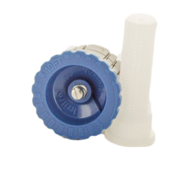 Irritrol PRO-VAN nozzle photographed with scale reference to illustrate the nozzle size and typical spray pattern radius for installation planning.