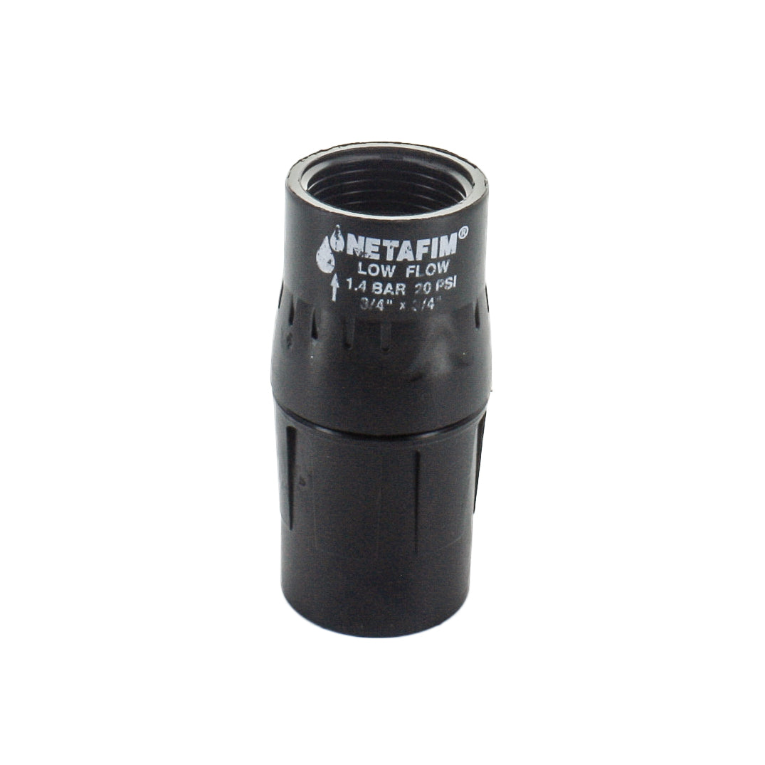 Front view of Netafim 3/4 in low-flow pressure regulator showing female threaded inlet and outlet on a thermoplastic body, ready for inline installation.