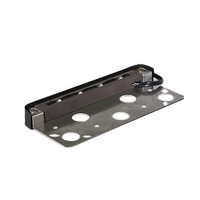 Bronze Pro-Trade LL2 ledge light on a masonry wall, showing warm 2700K illumination, compact length, and stainless-steel mounting plate.