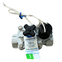 Close-up view of the Weathermatic SB-10F-HP solenoid and cover area, showing glass-filled nylon cover, stainless steel bolts and brass inserts, illustrating corrosion-resistant hardware.