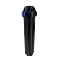 Angled front view of Rain Bird US412 Uni-Spray 4-inch pop-up spray head showing exposed cap, nozzle, and body details.