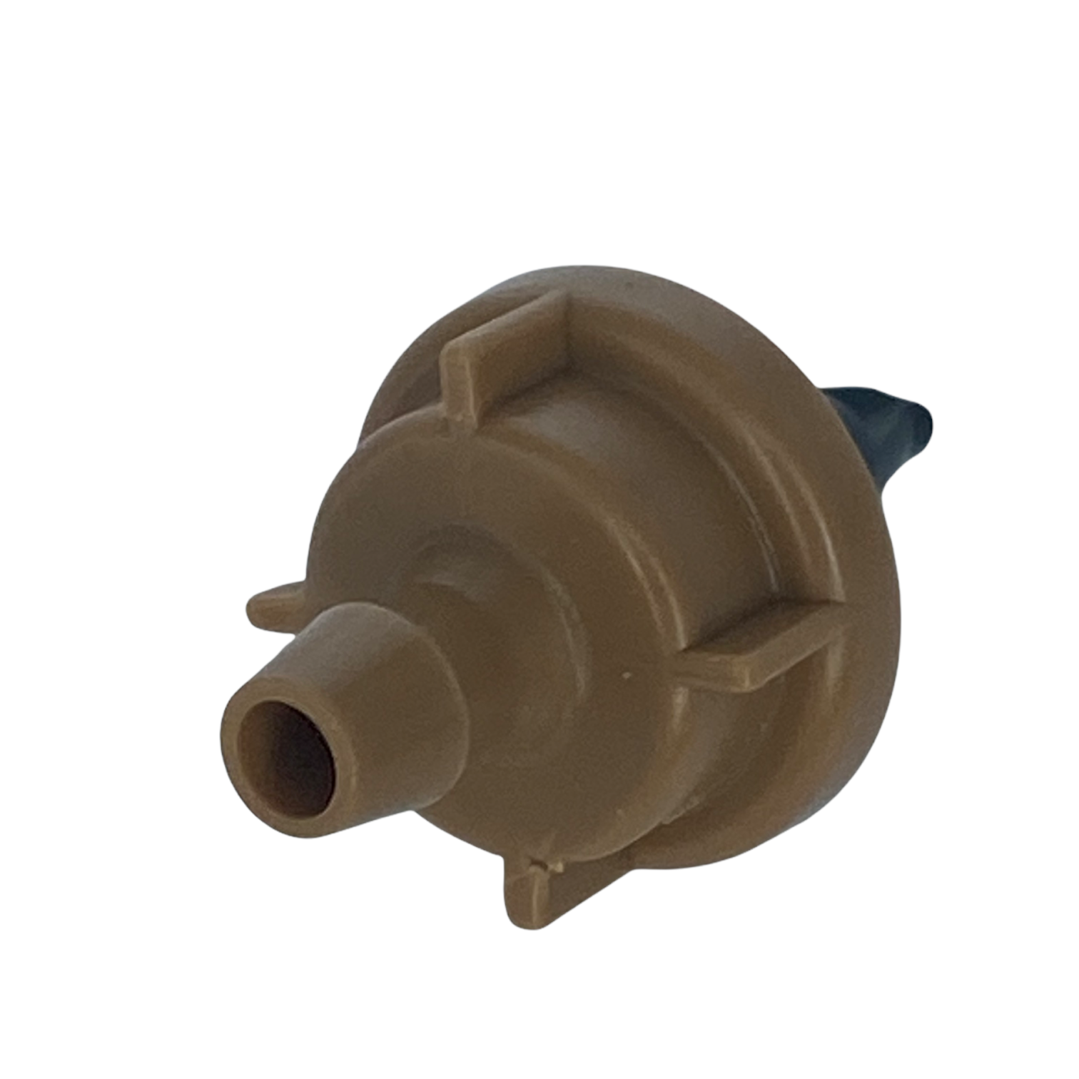 Angled view of Rain Bird PC05 pressure-compensating emitter highlighting self‑piercing barb inlet and compact UV-resistant plastic construction.