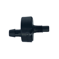 Close-up of Rain Bird Xeri-Bug XB10PC1032 1.0 GPH threaded emitter showing 10-32 inlet and outlet barb for 1/4" distribution tubing, black plastic.