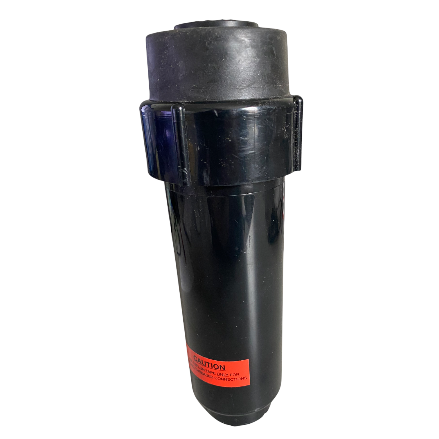 Front view of Toro 640 pop-up rotor showing rubber cover, stainless-steel nozzle assembly and compact body for commercial irrigation installations.
