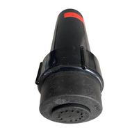 Angled close-up of sprinkler head and nozzle assembly highlighting Check-O-Matic check valve and durable cap.