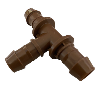 Angled close-up of XFF-TEE 17mm barb tee highlighting high-quality barbs, tube stop and low-profile design for XF dripline installations.