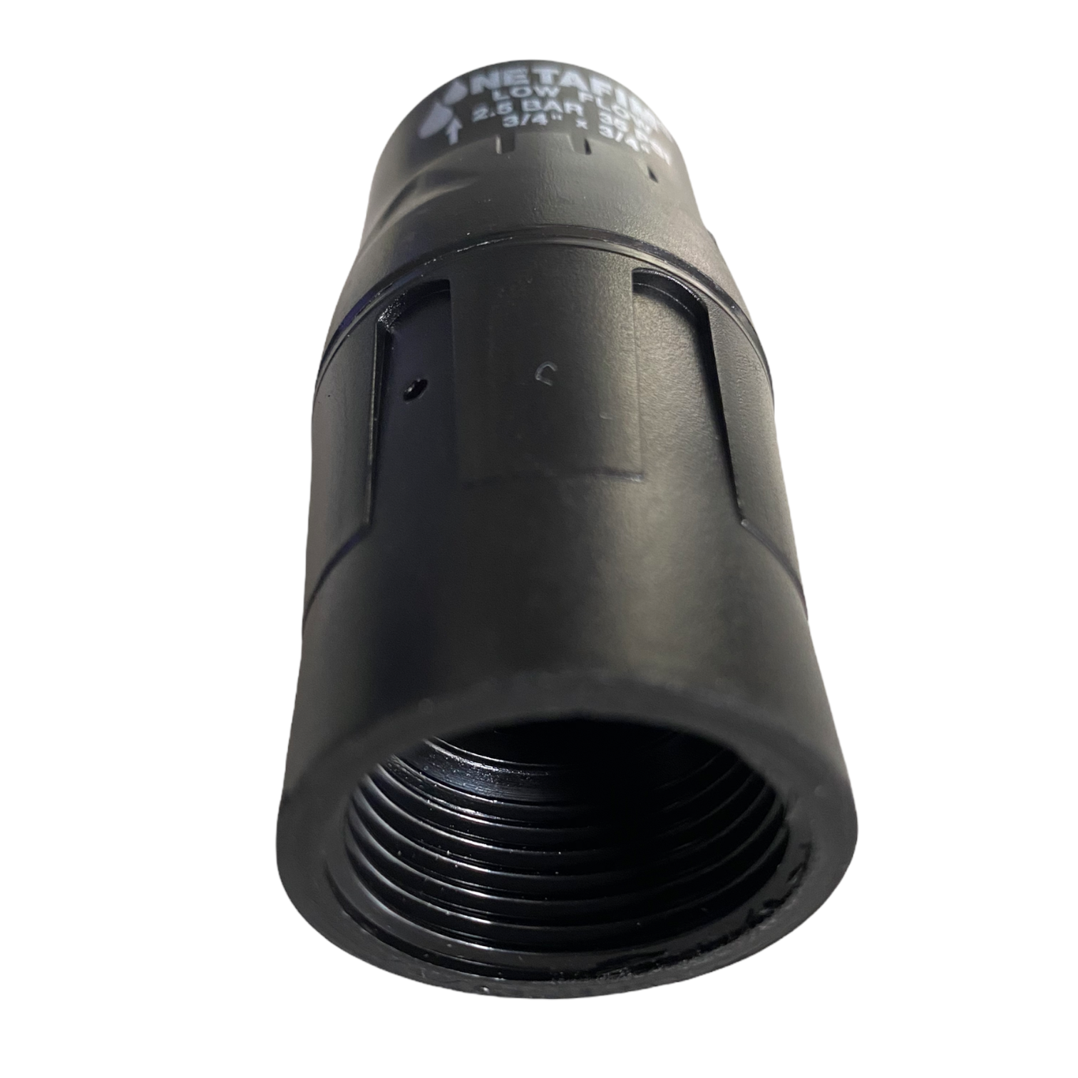 Close view of Netafim 3/4" low-flow pressure regulator (PRV075LF35V2K) showing threaded connection points and molded housing for outdoor irrigation.