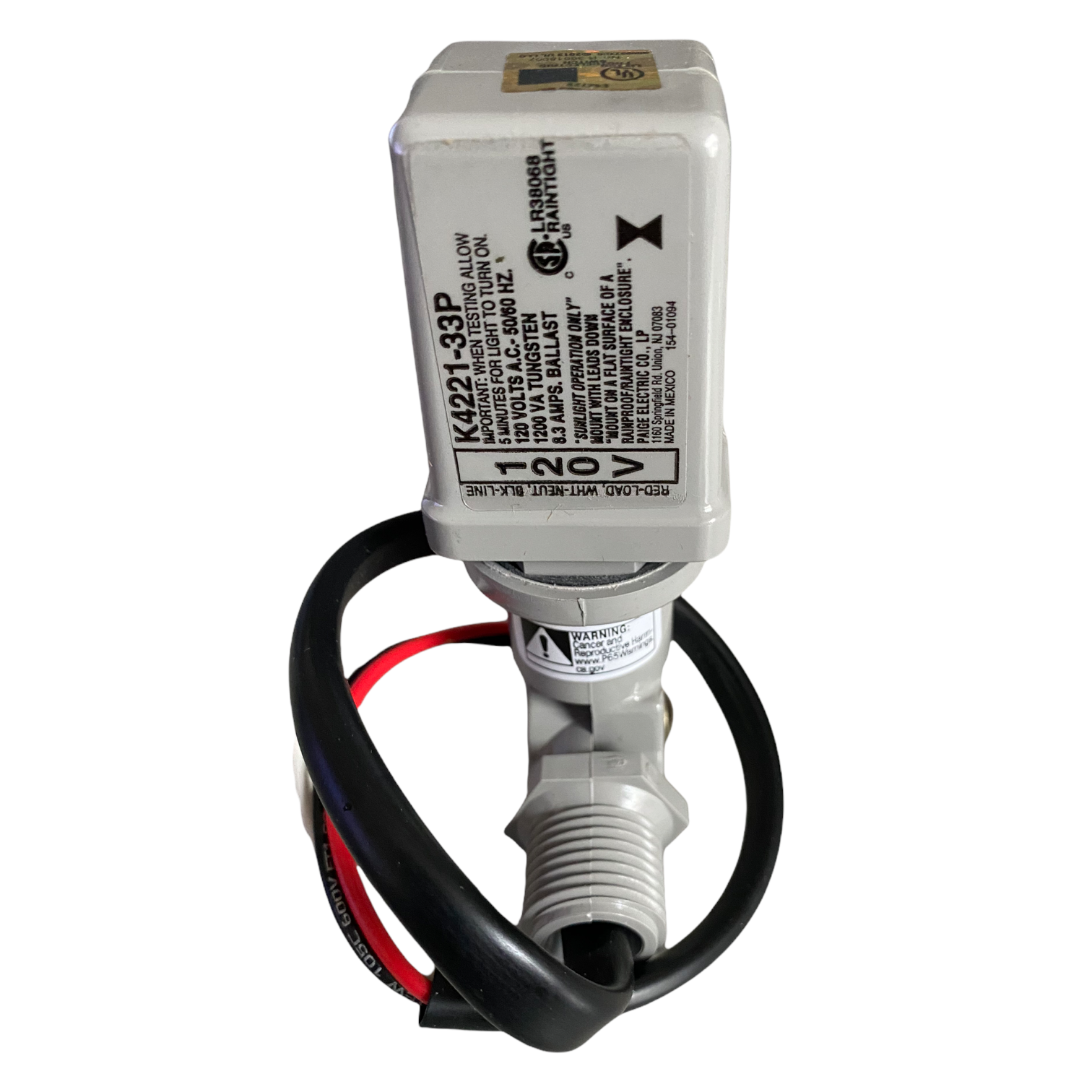 Product layout of SNPC2 snap-in photocell and cord, showing compact form factor and compatibility orientation for low-voltage landscape systems.