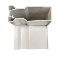 Detail view of NDS 8371 Micro Channel Tee showing underside and connection area for joining Micro Channel sections (white PVC).