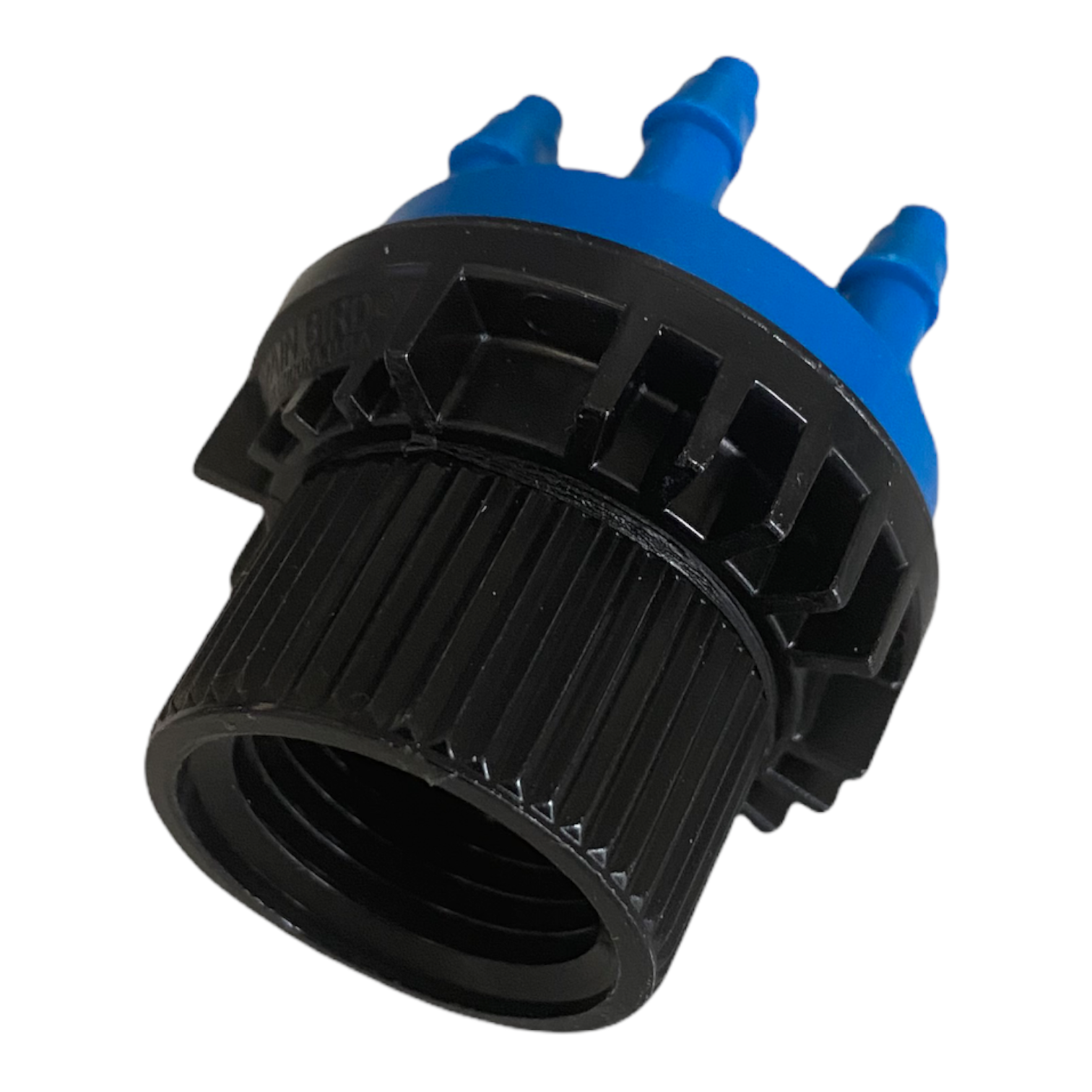 Packaged view of Rain Bird XBT056 shrub emitter with six outlet connection points visible, photographed on a neutral background for scale and identification.