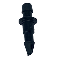 Close-up view of Rain Bird XBF1CONN 1/4-inch barb transfer connector showing barbed ends and stem for tool insertion, highlighting the self-piercing design.