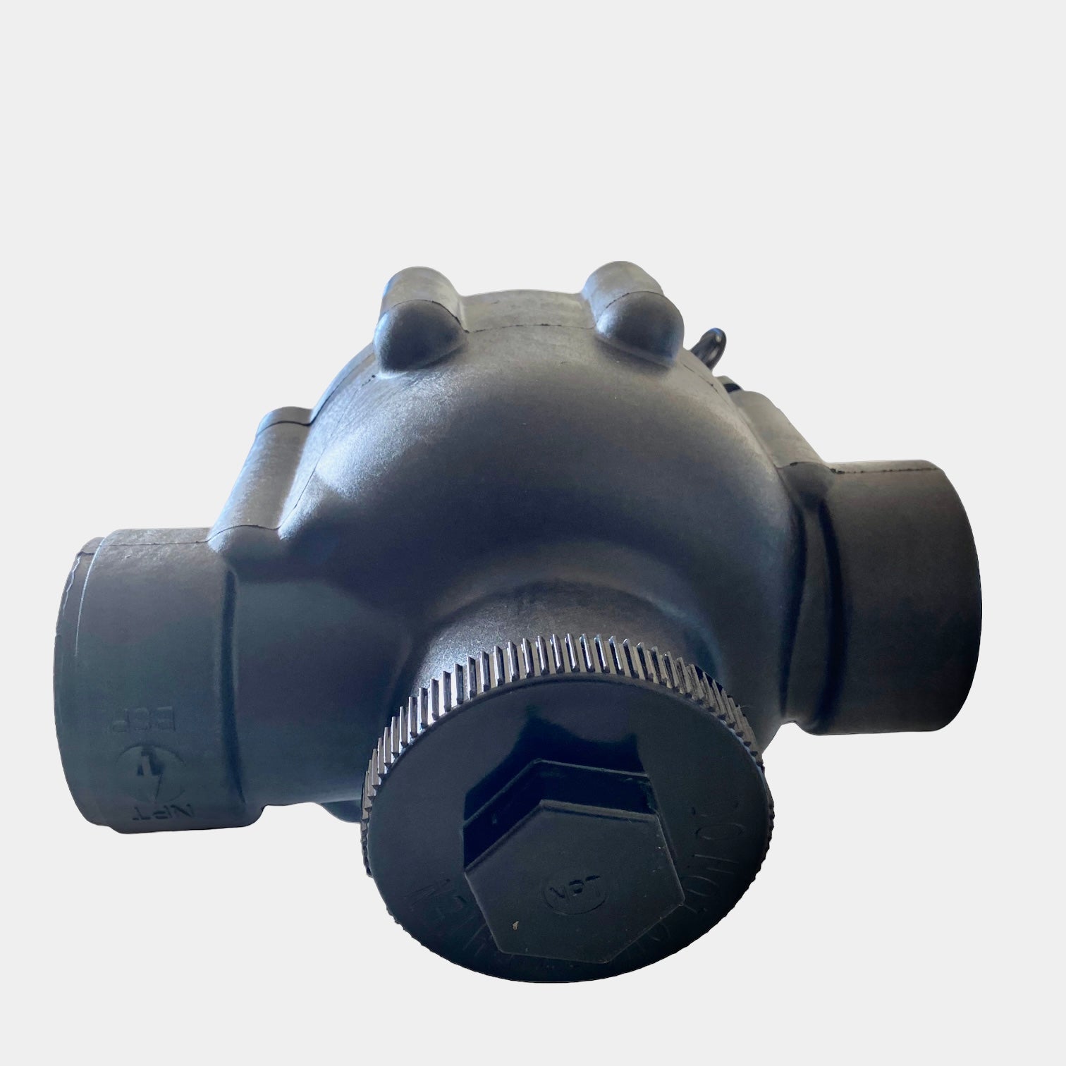 Side angle of Irritrol 100P2 irrigation valve highlighting internal bleed access, flow-control adjustment and stainless steel metering components in the valve assembly.