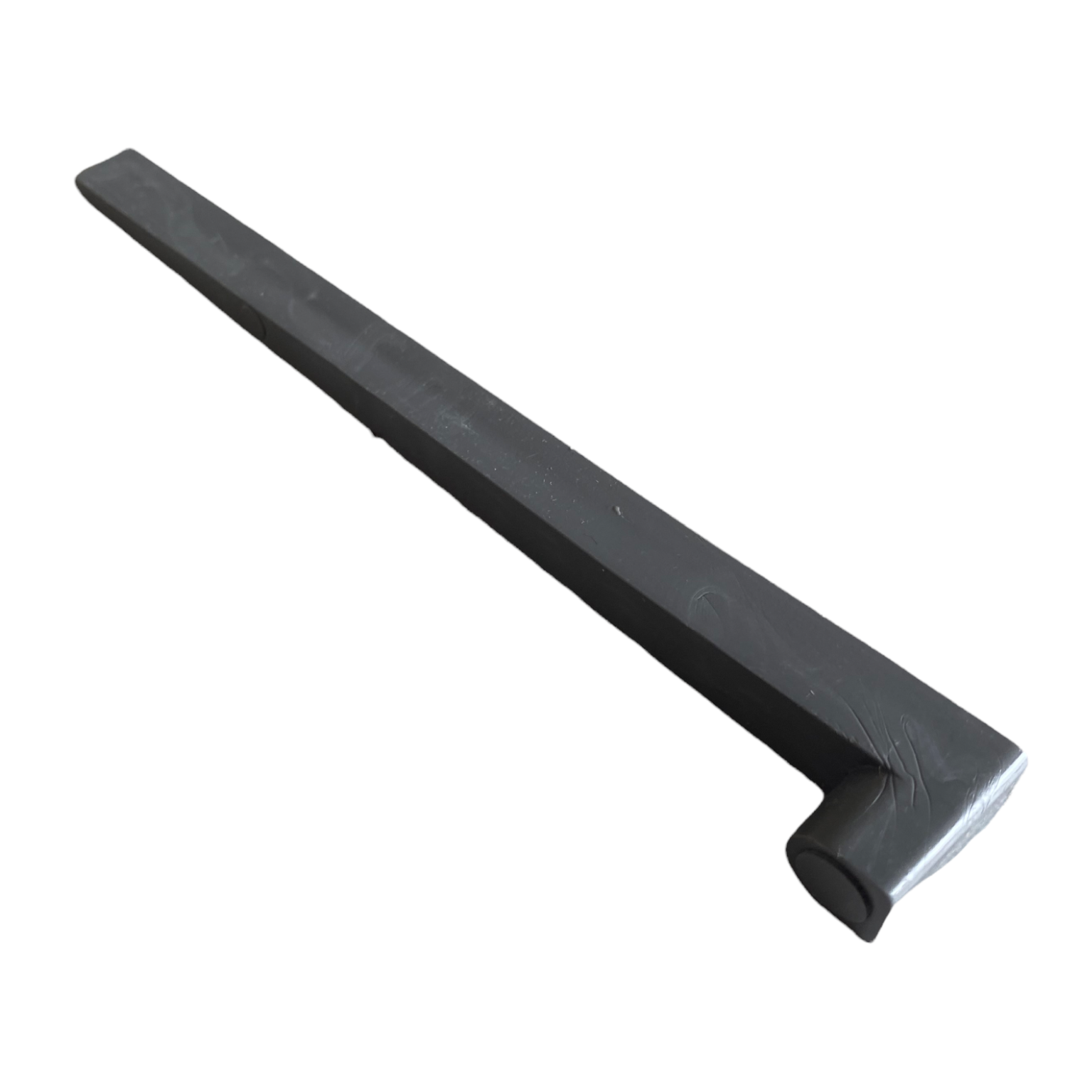 Top-down view of a single NDS 230 6-inch PVC channel installation stake, illustrating its length, cross-section, and tip design for placement.