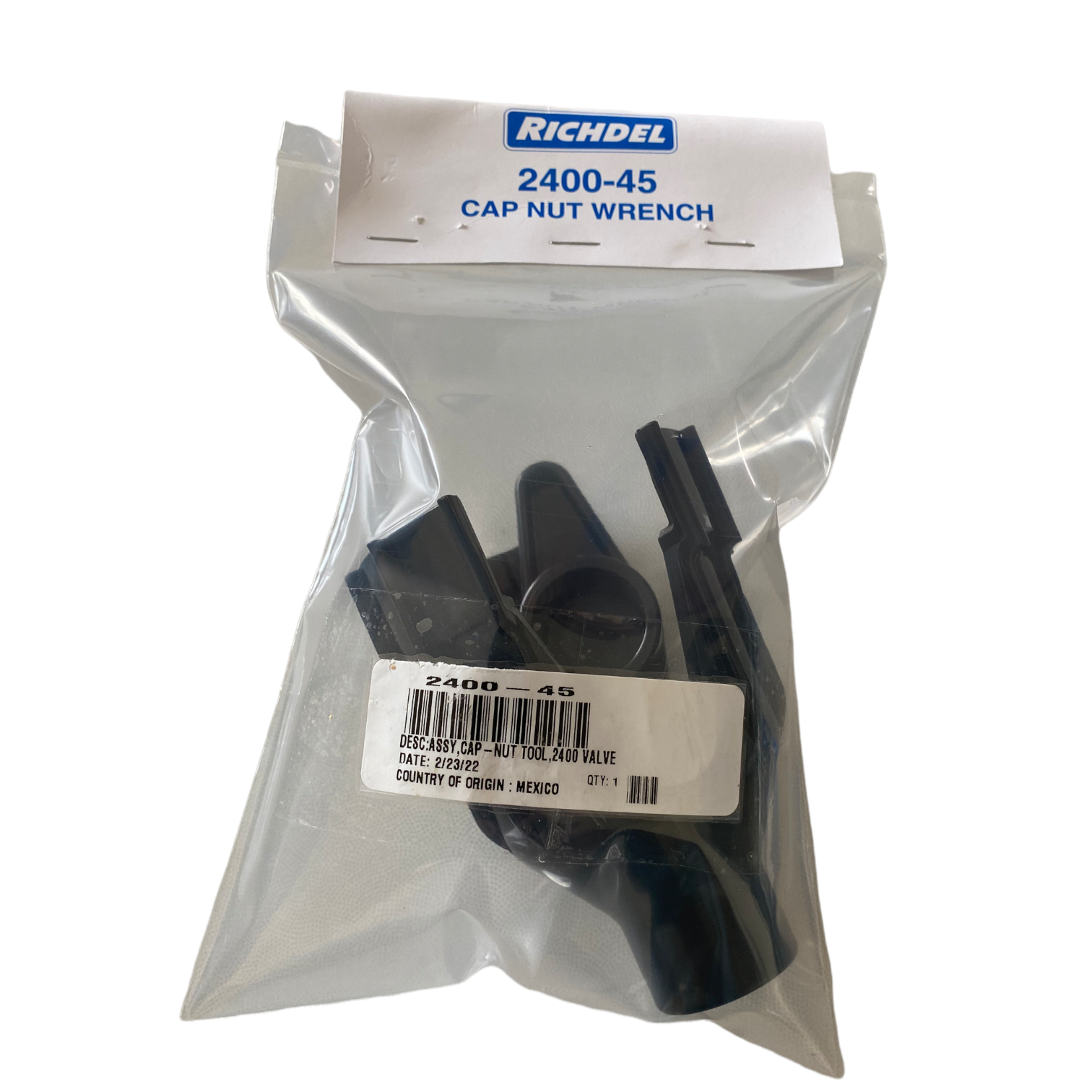 Irritrol 2400-45 bonnet wrench beside common irrigation valve parts to illustrate size and intended use for maintenance tasks.