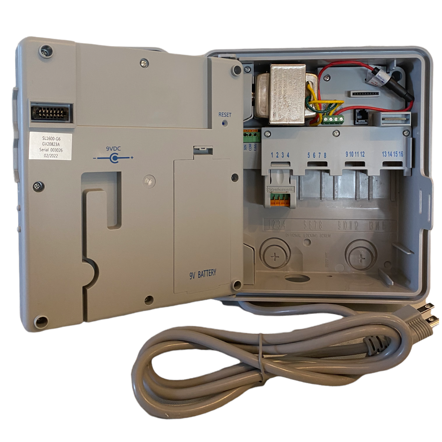 Side view of SmartLine SL1600 showing modular expansion slot and wiring knockouts for indoor or outdoor mounting.