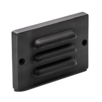Pro-Trade SL1 4.5-inch surface-mounted LED step light with louvered antique-brass faceplate and warm 2700K illumination.
