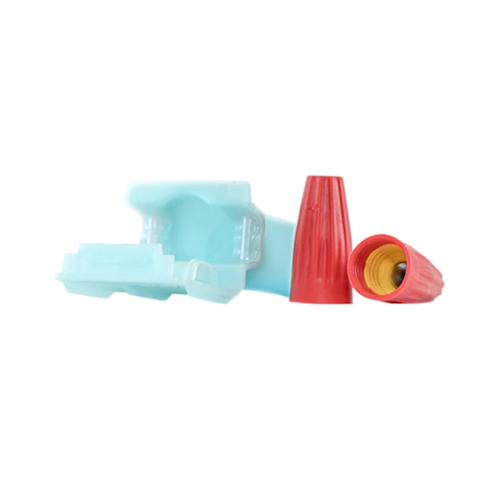 Close-up of Pro-Trade DBRY red/yellow Gorilla Nut cushion-grip connector inserted into silicone direct-bury tube, side angle.