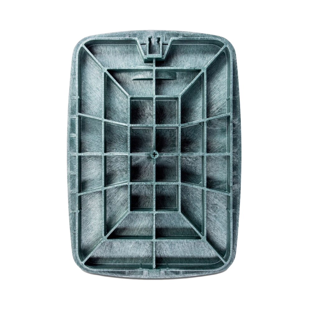 Angled view of the Rain Bird VBJMBL green HDPE jumbo lid illustrating knock-out provision, flange design, and lightweight construction for easy removal.