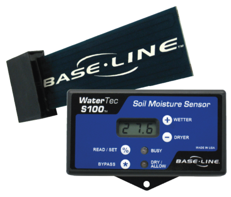 Baseline WaterTec S100 monitor front view with digital display and control buttons beside the BL-WTS100KIT biSensor probe, product image.