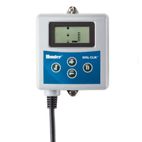 Soil‑Clik module and probe displayed on white background; shows module enclosure, push‑button and wiring terminals for installation (module + probe).