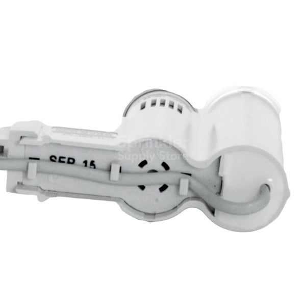 Installed Hunter Solar Sync Sensor SOLARSYNCSEN mounted on a gutter with visible wiring and bracket, illustrating typical field placement and orientation.