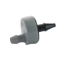 Close-up of Rain Bird SPB025 showing gray outlet barb and textured plastic body designed for secure tubing connection.