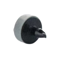 Angled view of Rain Bird SPB025 1/4-inch barb connector demonstrating compact profile and inlet/outlet orientation.