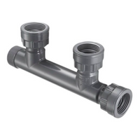 Spears 1-inch two-port PVC manifold tee showing two swivel x MIPT x swivel outlets with large O-Ring seals, gray finish.
