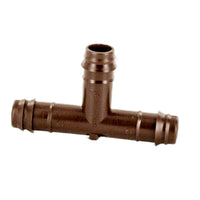 Close-up of Netafim Techline EZ T12TEE 12mm barbed insert tee showing three barbed outlets and molded one-piece polyethylene body for durability.