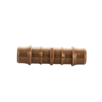 Netafim TLCOUP 17mm insert coupling on white background; brown barbed polyethylene fitting showing both insertion ends and center flange for reference.