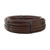 Netafim Techline EZ 12mm blank drip tubing 500 ft coil coiled on a white background, showing tubing texture, label, and coil size.