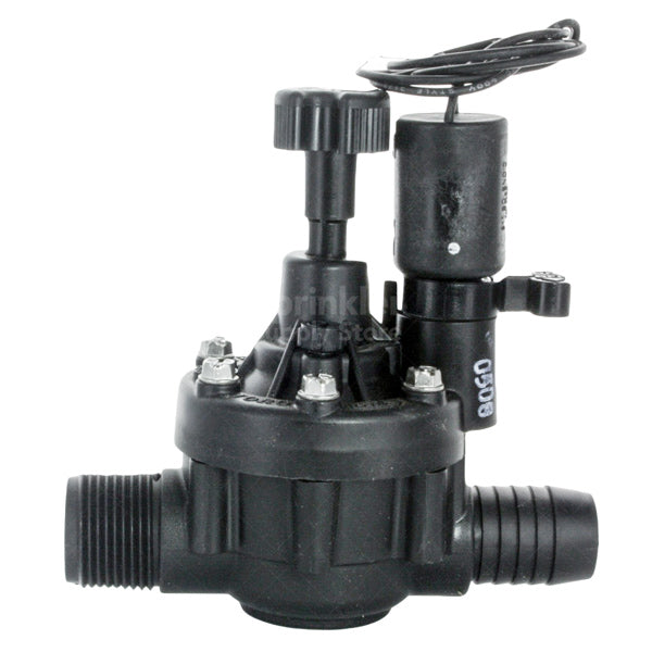 Close-up of Toro TPVF100MB flow control mechanism and barb outlet showing valve body detail and mounting provisions for solenoid assembly.