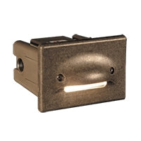 FX UN wall light in bronze metallic finish, compact 1-LED landscape fixture providing smooth, shadow-free illumination for walkways and architectural surfaces.