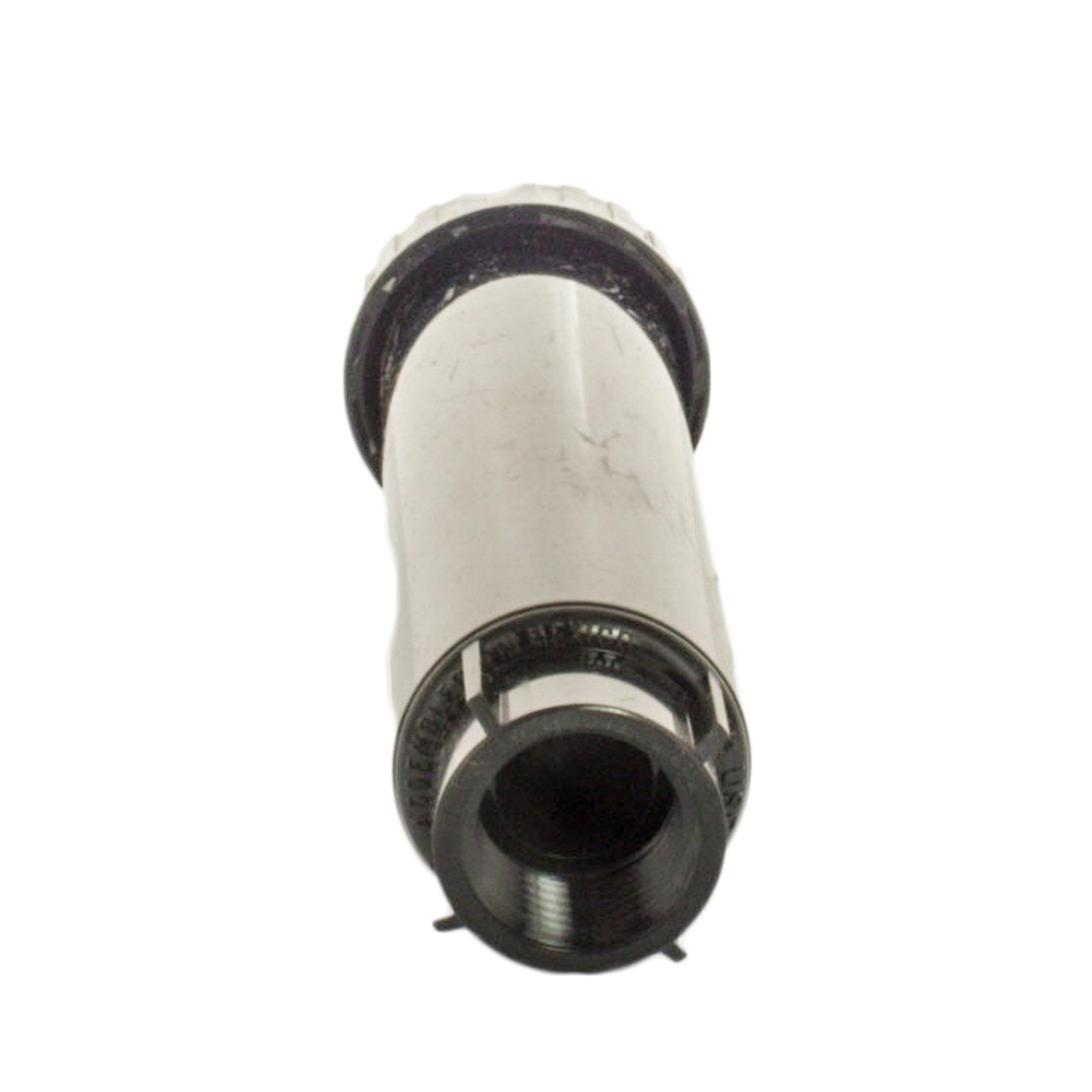 Top-down view of Rain Bird US415 Uni-Spray 4-inch pop-up showing removable nozzle, screen and durable cap for easy flushing and maintenance.