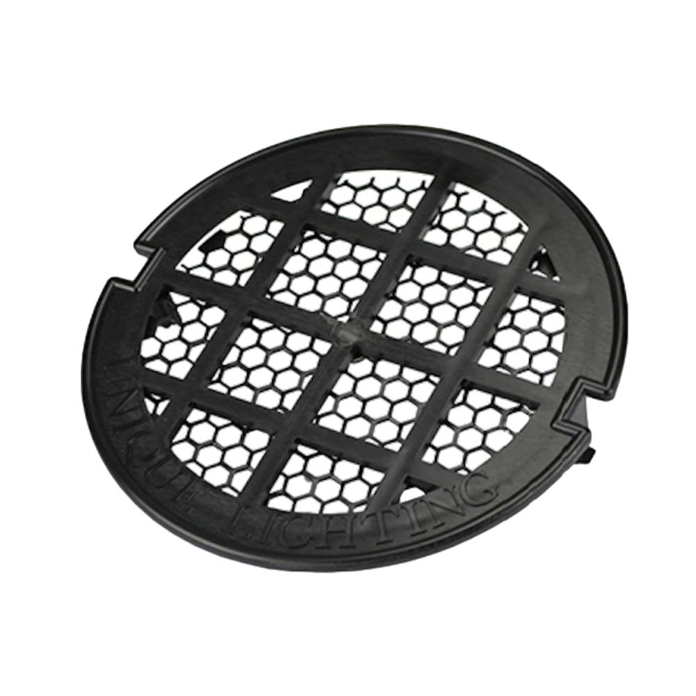 Black F100 well light grate (4800013) hex-louver resin debris guard for in-ground landscape lighting fixtures, impact-resistant and UV-stable.