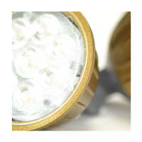 Scale view of Unique Flex Gold MR16 LED bulb with visible reflector and glass lens, illustrating size and beam spread intent for outdoor lighting.