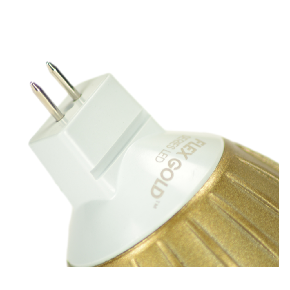 Angled close-up of Unique Flex Gold MR16 LED bulb highlighting lens, reflector and housing details for outdoor enclosed fixtures (series view).