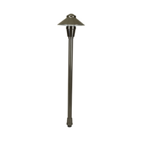 Bronze Neutron 12 path light with 7‑inch shroud, frosted borosilicate lens on 12" riser stake, shown angled for scale.