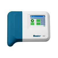 Front view of Hunter HC-1200i Hydrawise 12-station indoor Wi-Fi irrigation controller in closed plastic wall-mount enclosure, product label visible