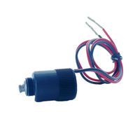 Close-up detail of the Toro 35-3099 solenoid coil and connector, highlighting mounting orientation and electrical connector location.
