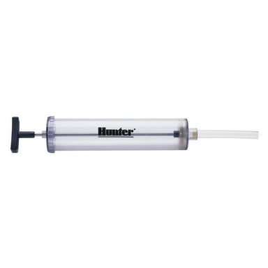 Hunter 460302 valve box hand pump shown next to a rectangular irrigation valve box, highlighting pump handle and nozzle.