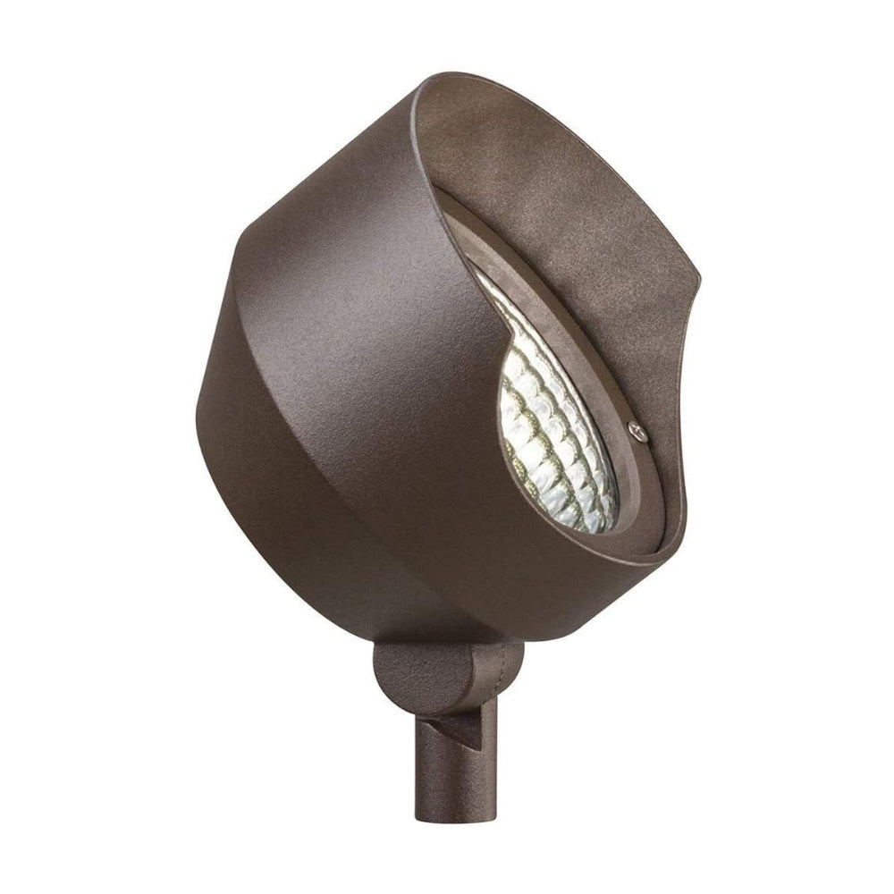 Front three-quarter view of Kichler 15390AZT adjustable PAR36 accent light in textured architectural bronze showing swivel head and clear lens (product photo).