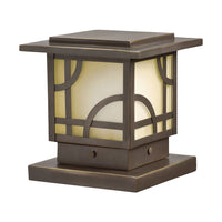 Front view of Kichler Larkin Estate 15474OZ low-voltage Olde Bronze deck/post light with warm umber etched glass.