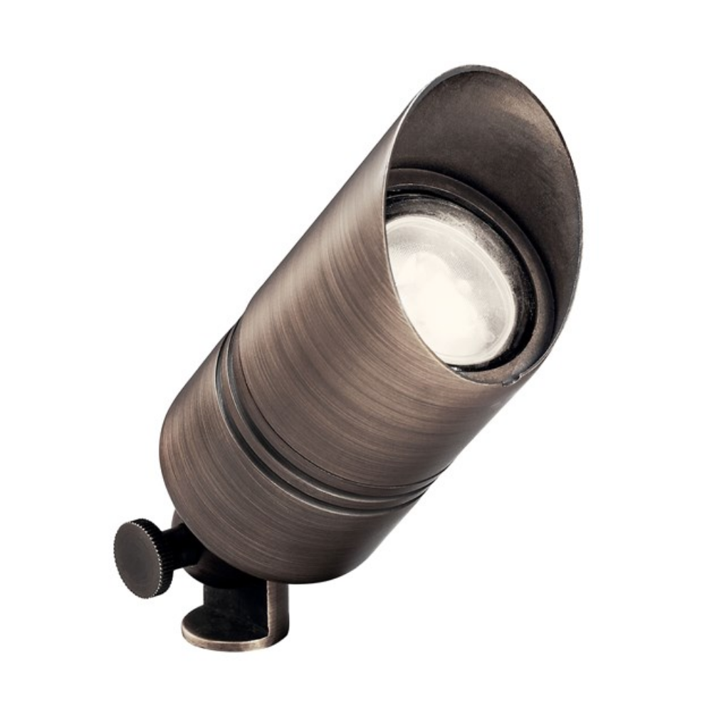 Kichler 15475CBR Centennial Brass low-voltage up light fixture, brass housing, compact profile shown on white background.