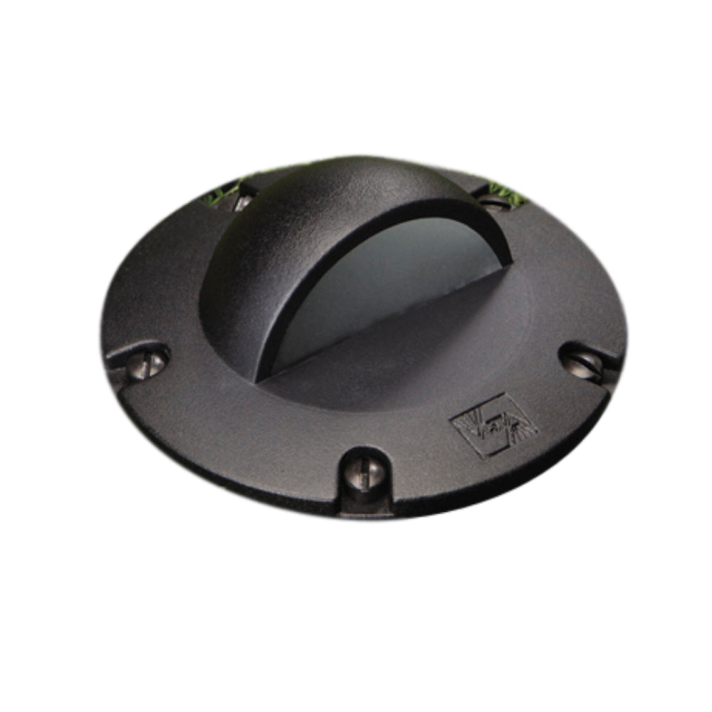 Vista GW-5263 in-ground well light aluminum housing in black with tempered glass lens, shown installed recessed in ground (angled view).