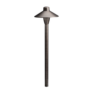 Kichler 15478CBR 12V path light in Centennial Brass, showing cast brass body, glass-lens dome, and in-ground stake.