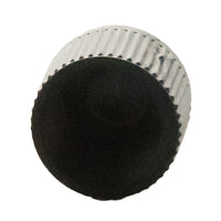 Close-up of Rain Bird XBT10 showing outlet barb and emitter profile; durable UV-resistant plastic construction is visible.