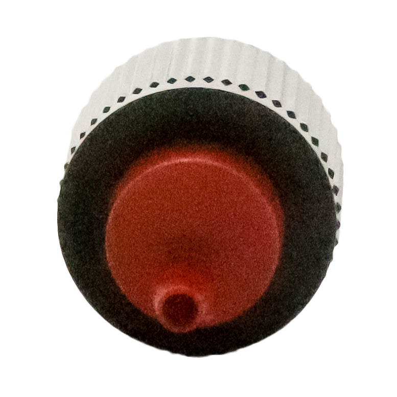 Angled detail of Rain Bird XBT20 showing 1/4" barb outlet and barbed tip for secure connection to tubing, red color.