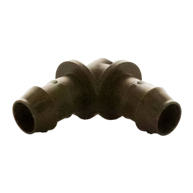 Close-up of Rain Bird XFFELBOW 17mm barb elbow highlighting redesigned barbs and secure insertion profile for XF Series dripline tubing.