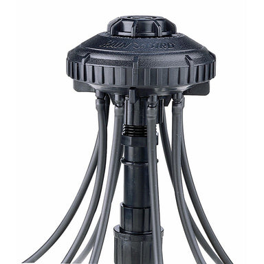 Top view of Rain Bird Xeri-Bird XBD-80 showing eight barbed outlets, removable port plugs and built-in 200-mesh filter for drip systems.